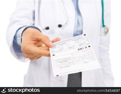 Closeup on doctor woman giving prescription