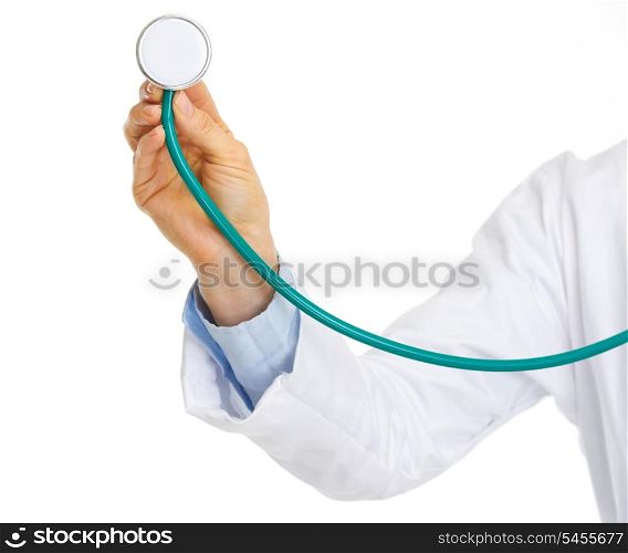 Closeup on doctor woman hand using stethoscope