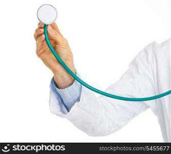 Closeup on doctor woman hand using stethoscope
