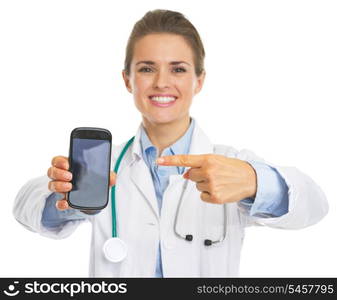 Closeup on doctor woman pointing on mobile phone