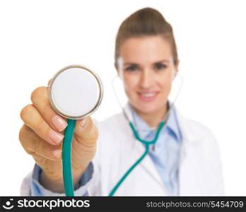 Closeup on doctor woman using stethoscope