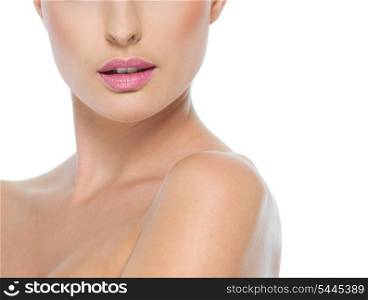 Closeup on female neck and lips isolated on white