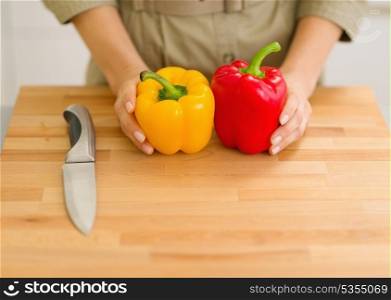Closeup on fresh bell peppers on cutting board