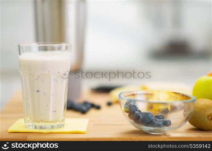 Closeup on fresh cocktail and fruits on cutting board