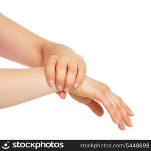 Closeup on hand holding wrist