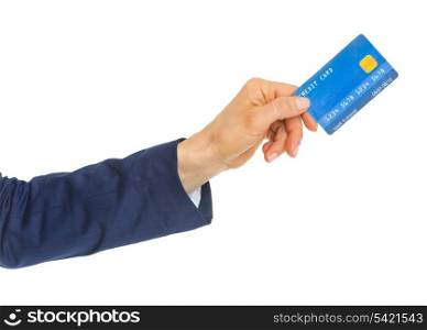 Closeup on hand of business woman giving credit card