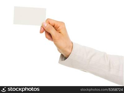 Closeup on hand of business woman holding business card