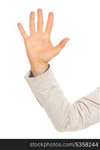 Closeup on hand of business woman showing five fingers