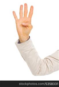 Closeup on hand of business woman showing four fingers