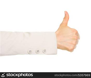 Closeup on hand of business woman showing thumbs up