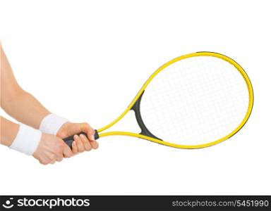 Closeup on hand of female tennis player holding racket