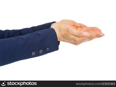 Closeup on hands of business woman presenting something on empty palm