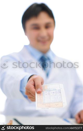 Closeup on hands of medical doctor with prescription
