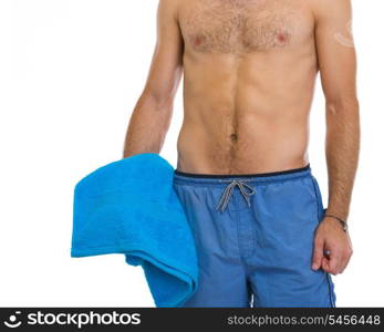 Closeup on man holding blue beach towel