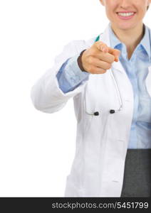 Closeup on medical doctor woman pointing in camera