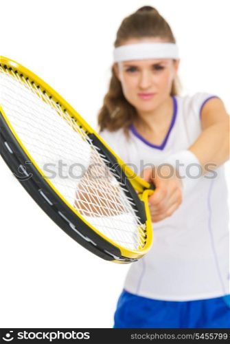 Closeup on racket in hand of tennis player