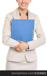 Closeup on smiling business woman holding folder