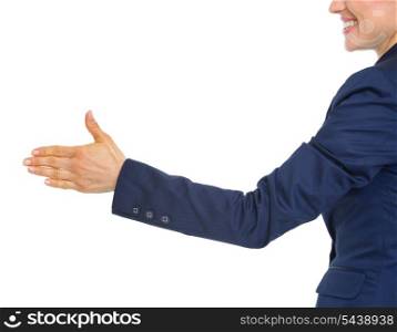 Closeup on smiling business woman stretching hand for handshake