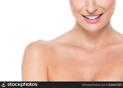 Closeup on smiling female lips isolated on white