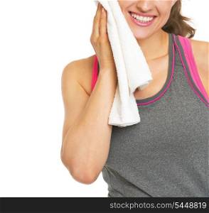 Closeup on smiling fitness young woman towel