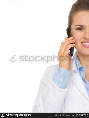 Closeup on smiling medical doctor woman speaking mobile phone