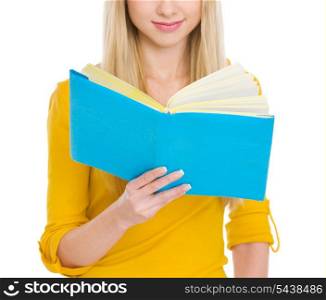 Closeup on student girl reading book