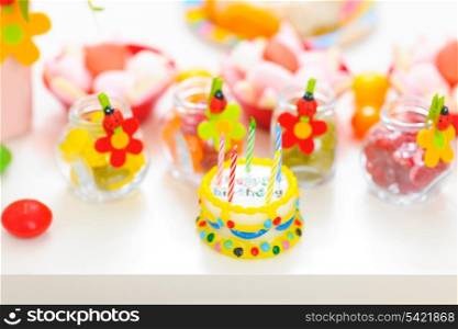 Closeup on table decorated for child birthday celebration