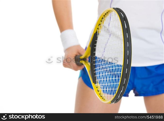 Closeup on tennis player holding tennis racket