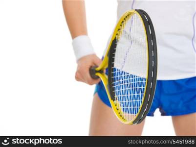 Closeup on tennis player holding tennis racket