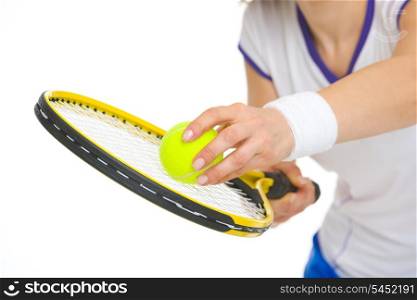 Closeup on tennis player ready to serve ball