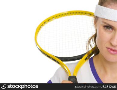 Closeup on tennis player with racket