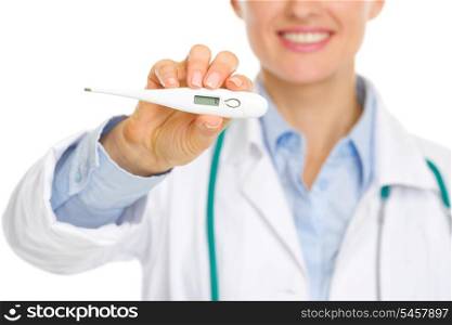 Closeup on thermometer in hands of smiling medical doctor
