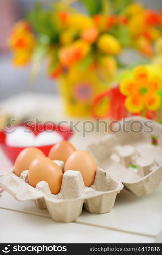 Closeup on tray with eggs ready for Easter decoration