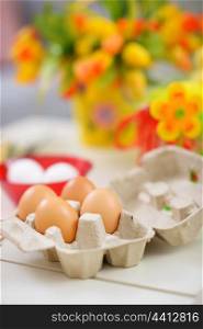 Closeup on tray with eggs ready for Easter decoration