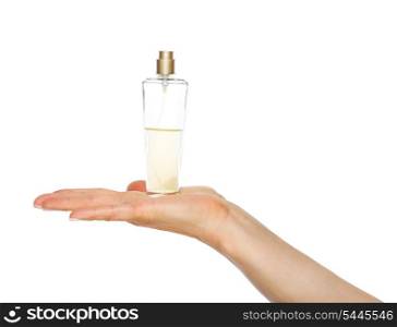 Closeup on woman hand showing perfume bottle