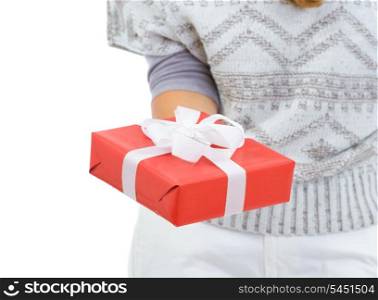 Closeup on woman holding Christmas gift box
