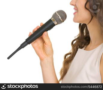 Closeup on young woman with microphone