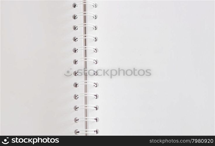 Closeup open spiral notebook, stock photo
