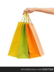 closeup or picture of multi colored shopping bags .