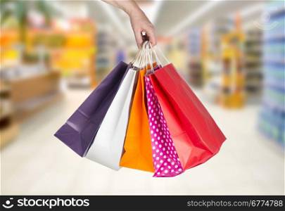 closeup or picture of multi colored shopping bags .