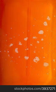 closeup - orange motor oil with bubbles texture background