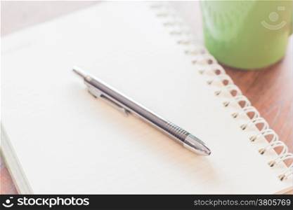 Closeup pen and spiral notebook, stock photo