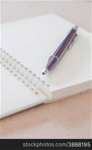 Closeup pen with spiral notebook, stock photo