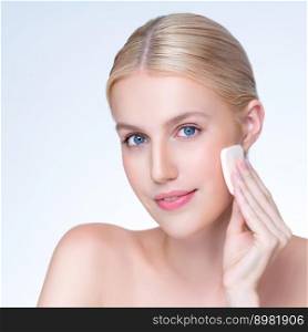 Closeup personable beautiful natural soft makeup woman using powder puff for facial makeup concept. Cushion foundation applying on young girl face in isolated background.. Closeup personable natural makeup woman using powder puff for facial makeup.