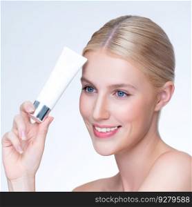Closeup personable beautiful perfect natural skin woman hold mockup tube moisturizer cream for skincare treatment product advertising expressive facial and gesture expression in isolated background.. Closeup personable perfect skin woman holding mockup moisturizer product.