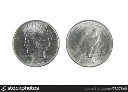 Closeup photo of a Two Peace Silver Dollars, obverse and reverse sides, isolated on white