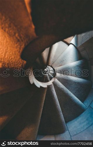 Closeup photo of a vintage spiral stair, corkscrew staircase, ancient construction, abstract background, amazing interior architecture, Spain