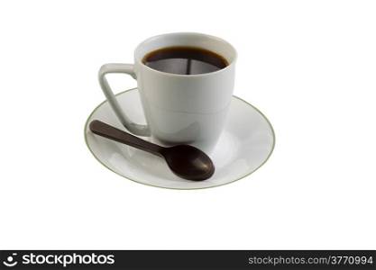 Closeup photo of black coffee, in small cup, dark chocolate spoon with saucer underneath isolated on white