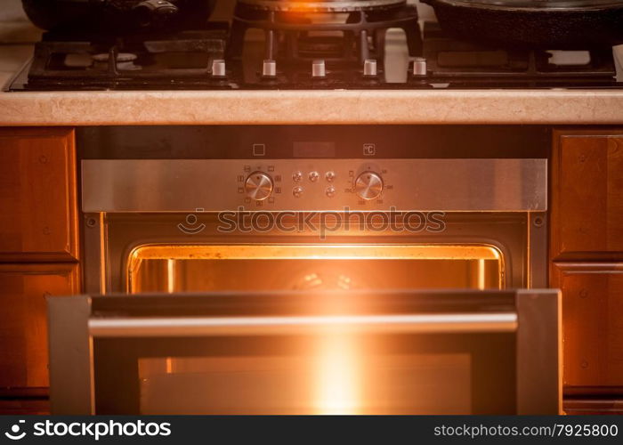 Closeup photo of open incandescent open oven