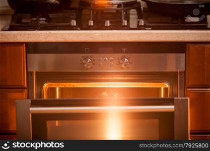 Closeup photo of open incandescent open oven